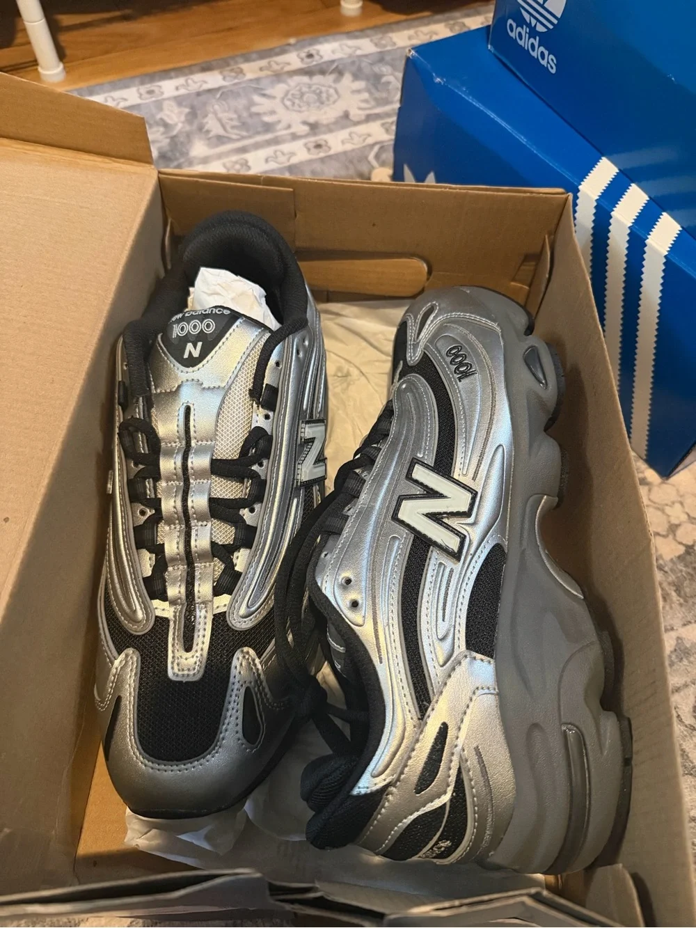 New Balance  Men Silver and Black 1000 Athletic Sneakers